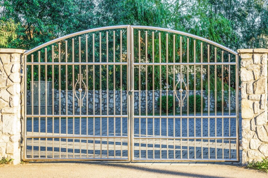 should driveway gates open in or out